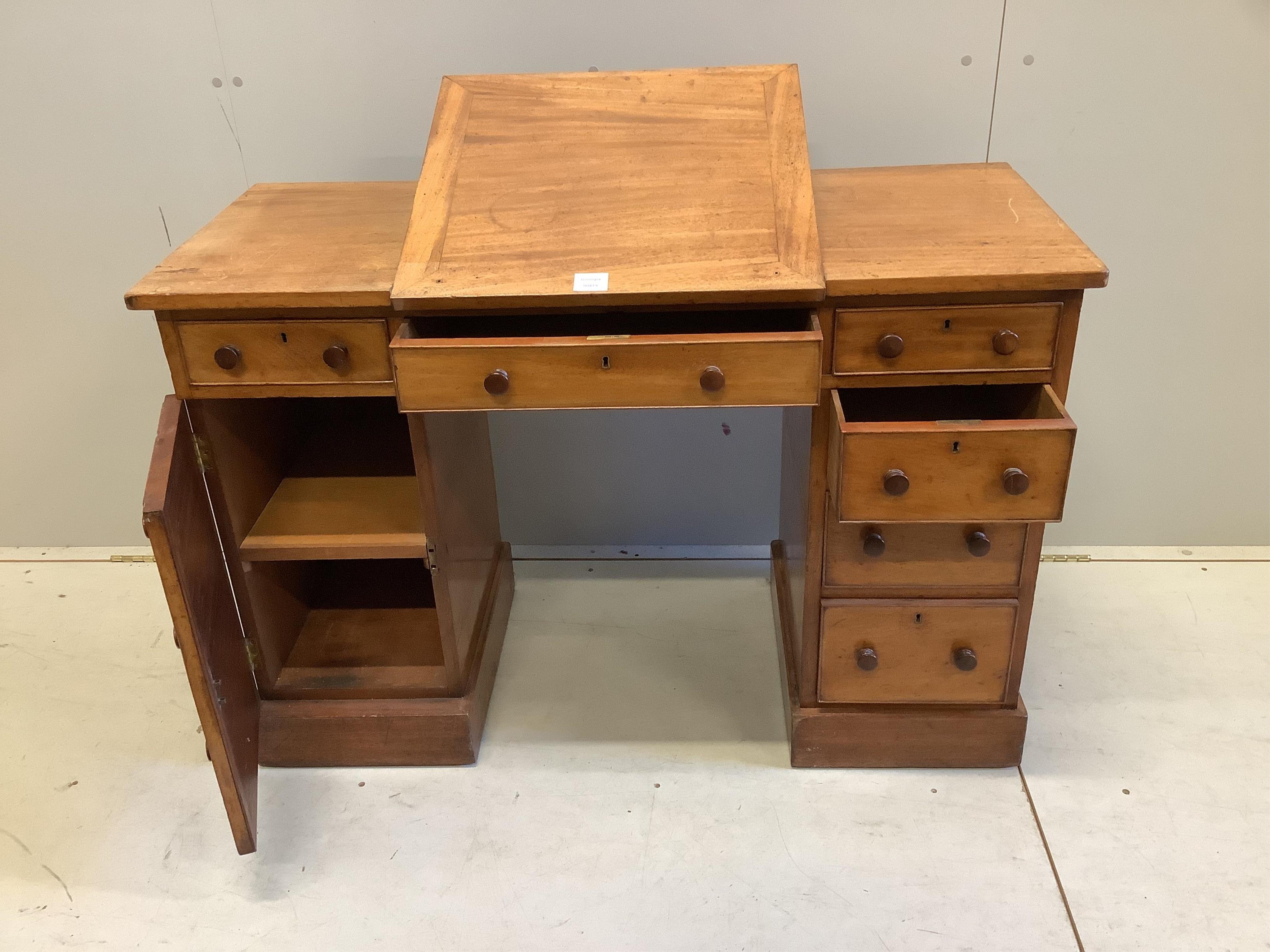 A Victorian pale mahogany metamorphic kneehole desk by Miles & Edwards, 134 Oxford Street, London, width 114cm, depth 48cm, height 76cm. Condition - fair to good.